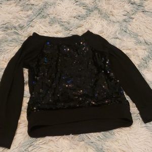 I am selling a long sleeve sparkly shirt